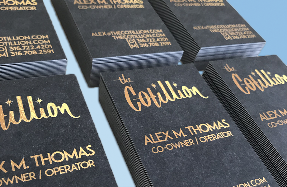 Stacks of printed business cards.